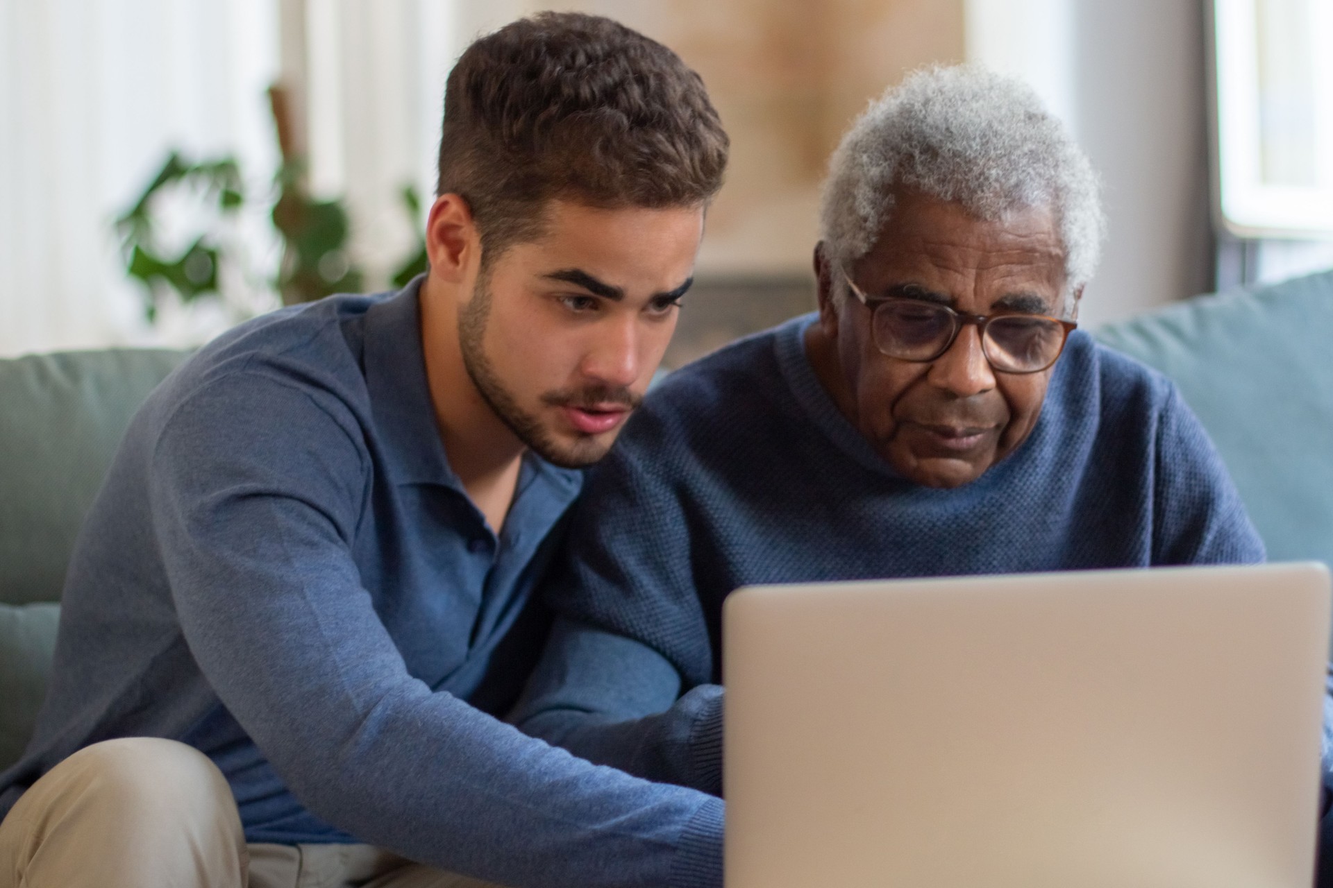 Portrait of aged calgary man and his grandson enjoying time together